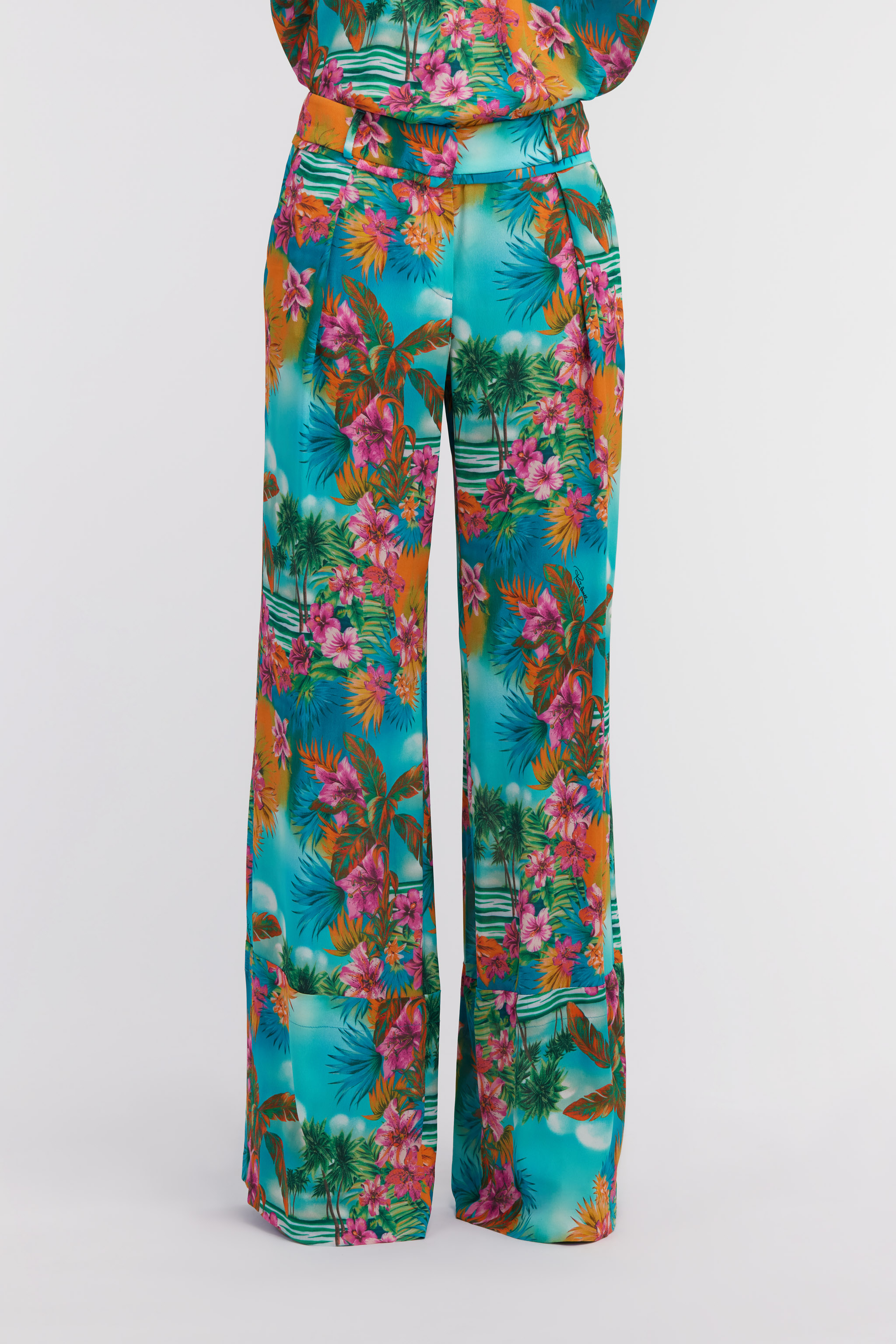 Shop Roberto Cavalli Hawaii Print Trousers In Light Blue